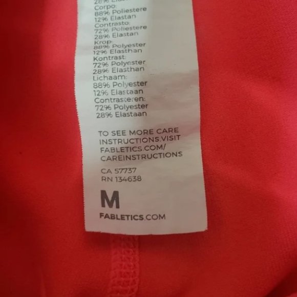 Fabletics On-the-Go High-Waisted Capri in Pop Coral - Picture 11 of 12